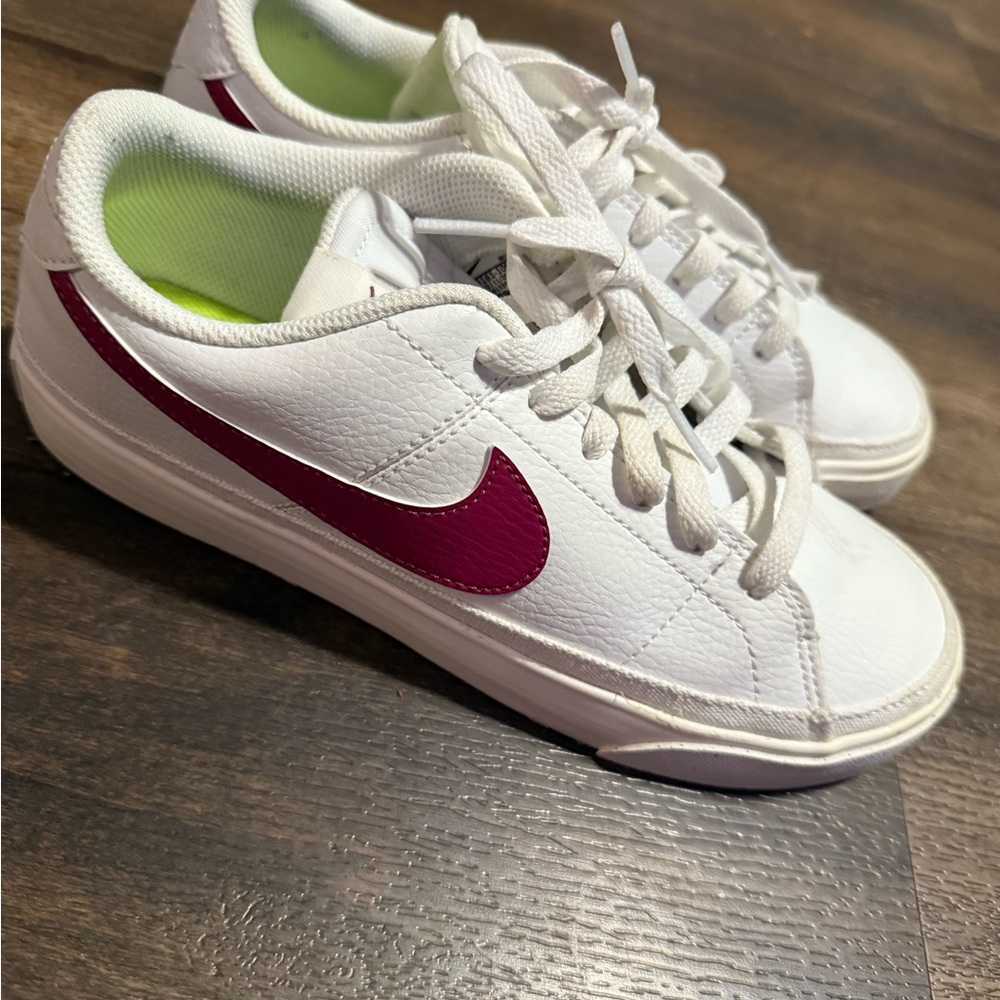 Nike White Sneakers with Bold Pink Swoosh